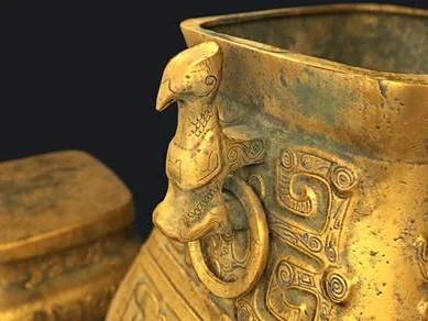 An ornate bronze ritual vessel with raised relief patterning and green patina