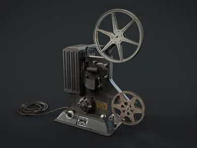 A twin-reel film projector with cast metal housing and a coiled power lead