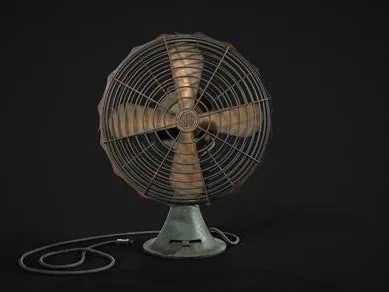 A weathered industrial floor fan with a wire cage, cast base and trailing cable